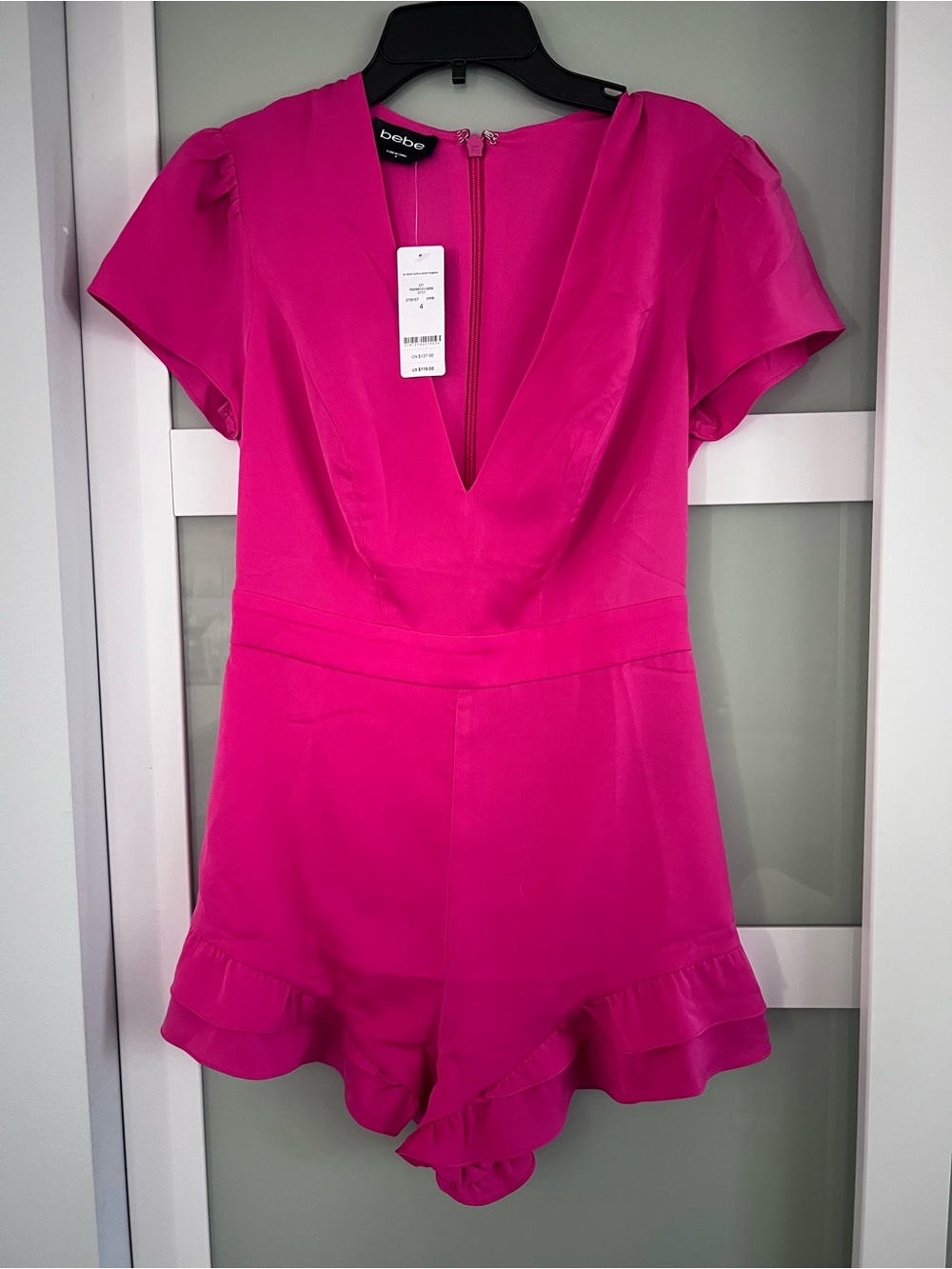 Bebe pink romper size 4.